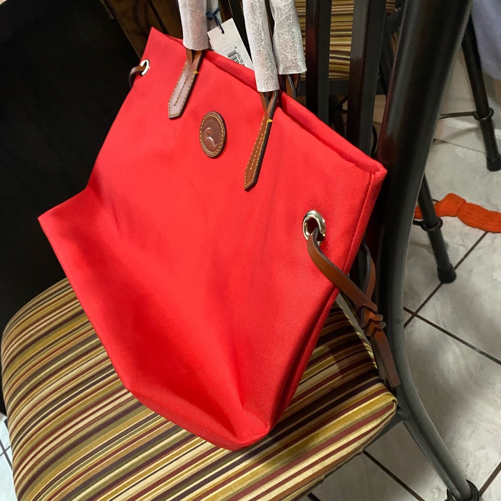 Brand new red Doonney & Bourke purse